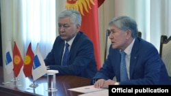 Иса Өмүркулов жана Алмазбек Атамбаев. 