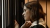 Nadezhda Tolokonnikova looks on as a petition for her early release from custody is heard at a court in the Mordovian town of Zubova Polyana in April.