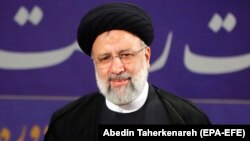 Judiciary chief and presidential hopeful Ebrahim Raisi registers his candidacy for the presidential election at the Interior Ministry in Tehran on May 15.