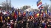 Moldovan supporters of reunification with Romania rally in Chisinau.