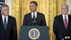 U.S. President Barack Obama (center) announces his nominations for CIA director, John Brennan (right), and defense secretary, Chuck Hagel, in Washington, D.C., on January 7