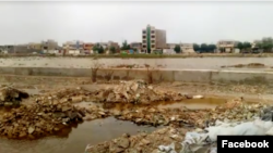 Amnesty says construction began earlier this year near the site where dozens of prisoners killed during a wave of mass extrajudicial executions in August and September 1988 are buried.