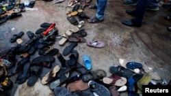 A view of footwear left behind after the deadly stampede in Karachi on March 31.