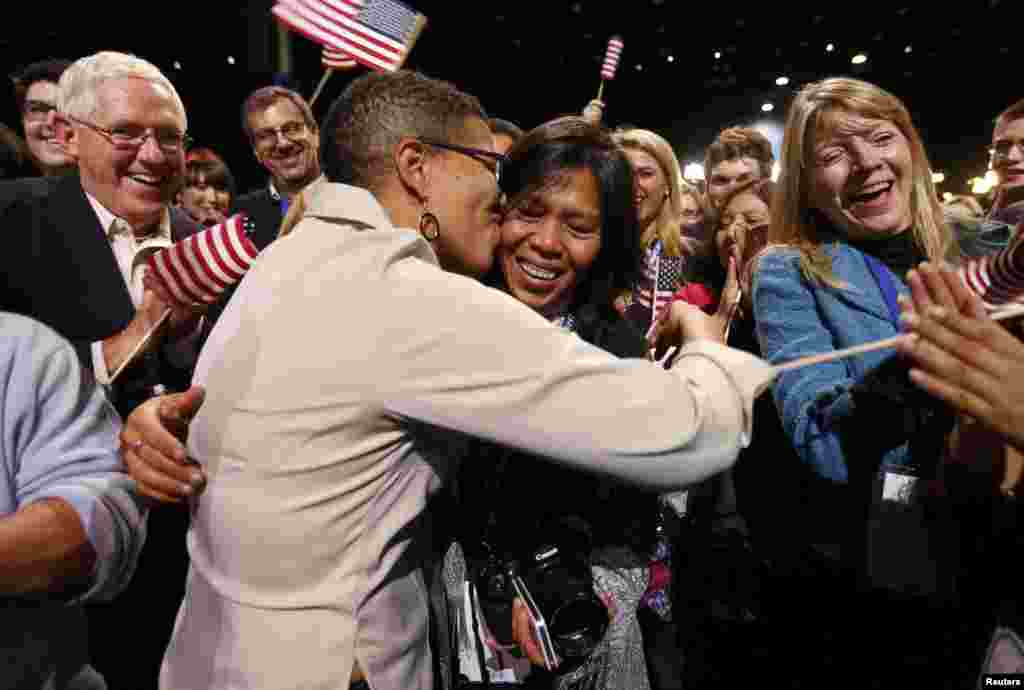 Keesha Patterson (left) of Ft. Washington, Maryland, proposes marriage to her girlfriend Rowan Ha during an election-night rally at Obama's campaign headquarters in Chicago. Obama has expressed support for the legalization of same-sex marriage.