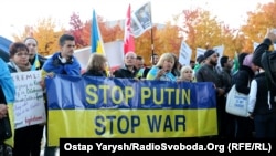 Акция протеста в Берлине накануне саммита "нормандской четверки"
