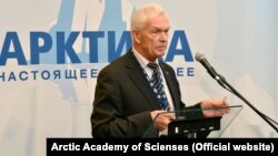 Valery Mitko was placed under house arrest in February 2020 for allegedly transferring classified materials to China during regular visits he made there as a teacher. (file photo)